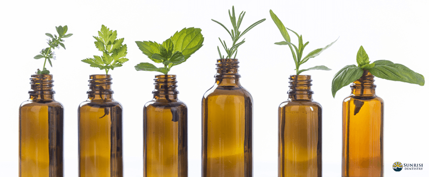 SD-Bottle of essential oil with herbs