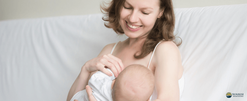 SD-Young woman breastfeeding