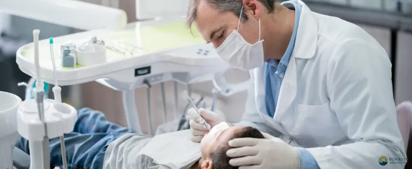 SD-a pediatric dentist checking the teeth