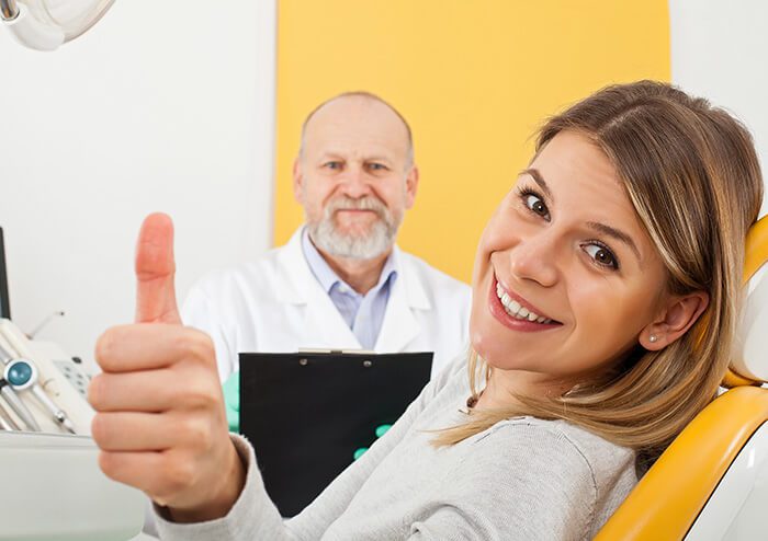 SD Woman with Beautiful Smile doing a Thumbs Up