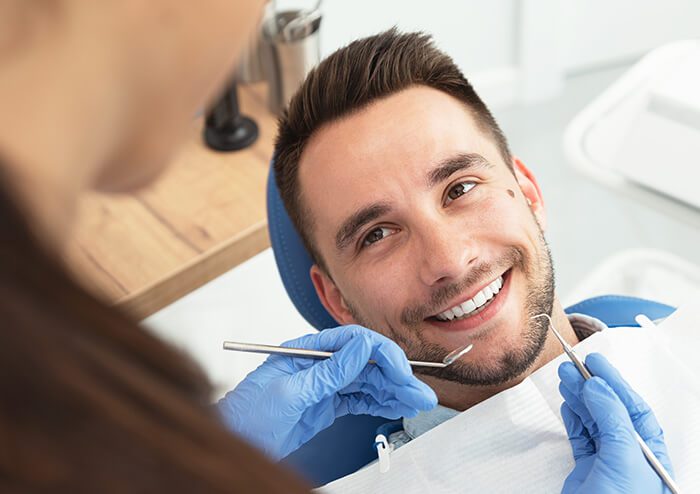SD Patient Smiling at Dentist