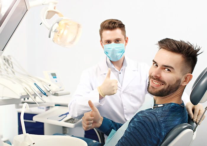 SD Dentist and Patient thumbs up