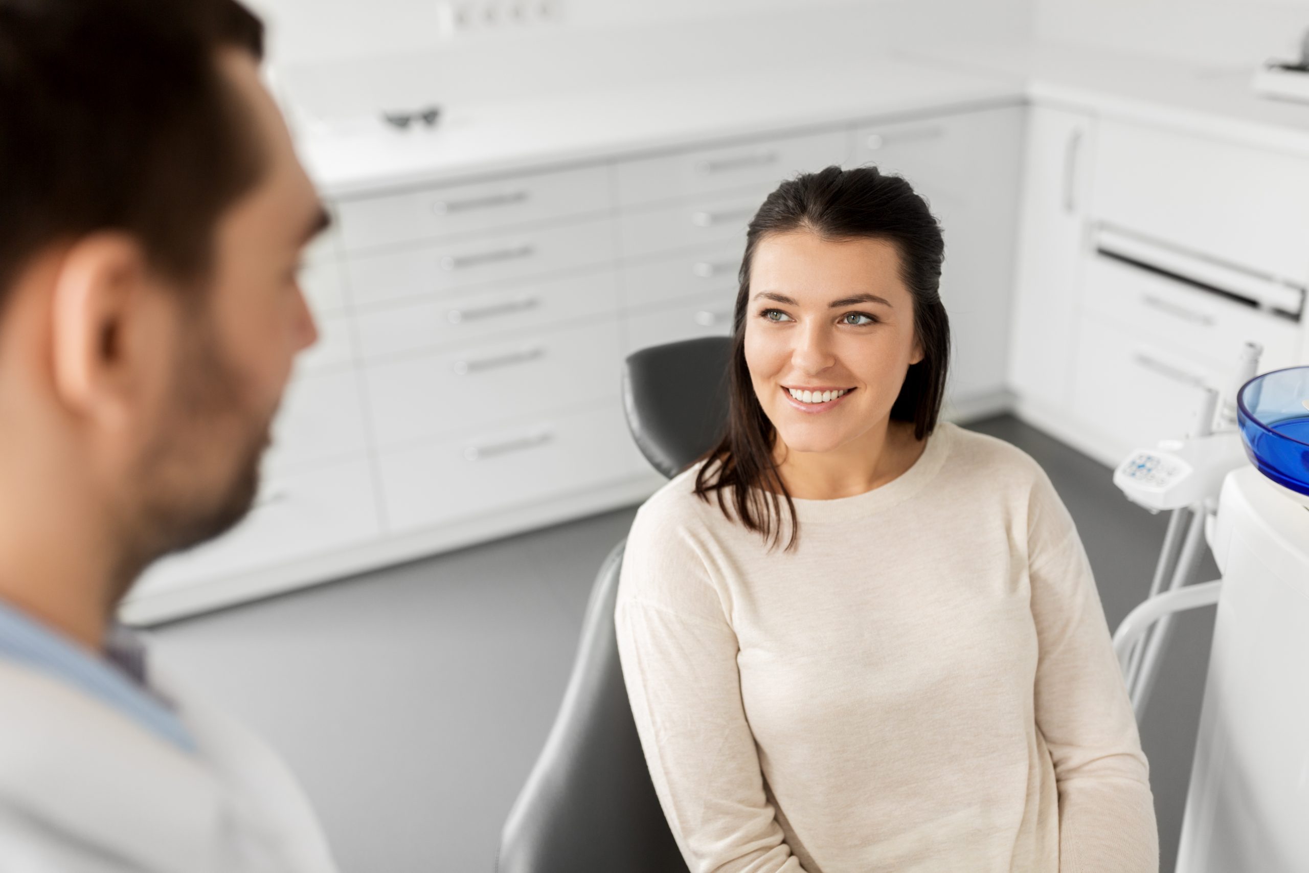 SD Woman smiling at her dentist